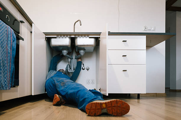 Professional Drain Cleaning technician working in Portland, IN